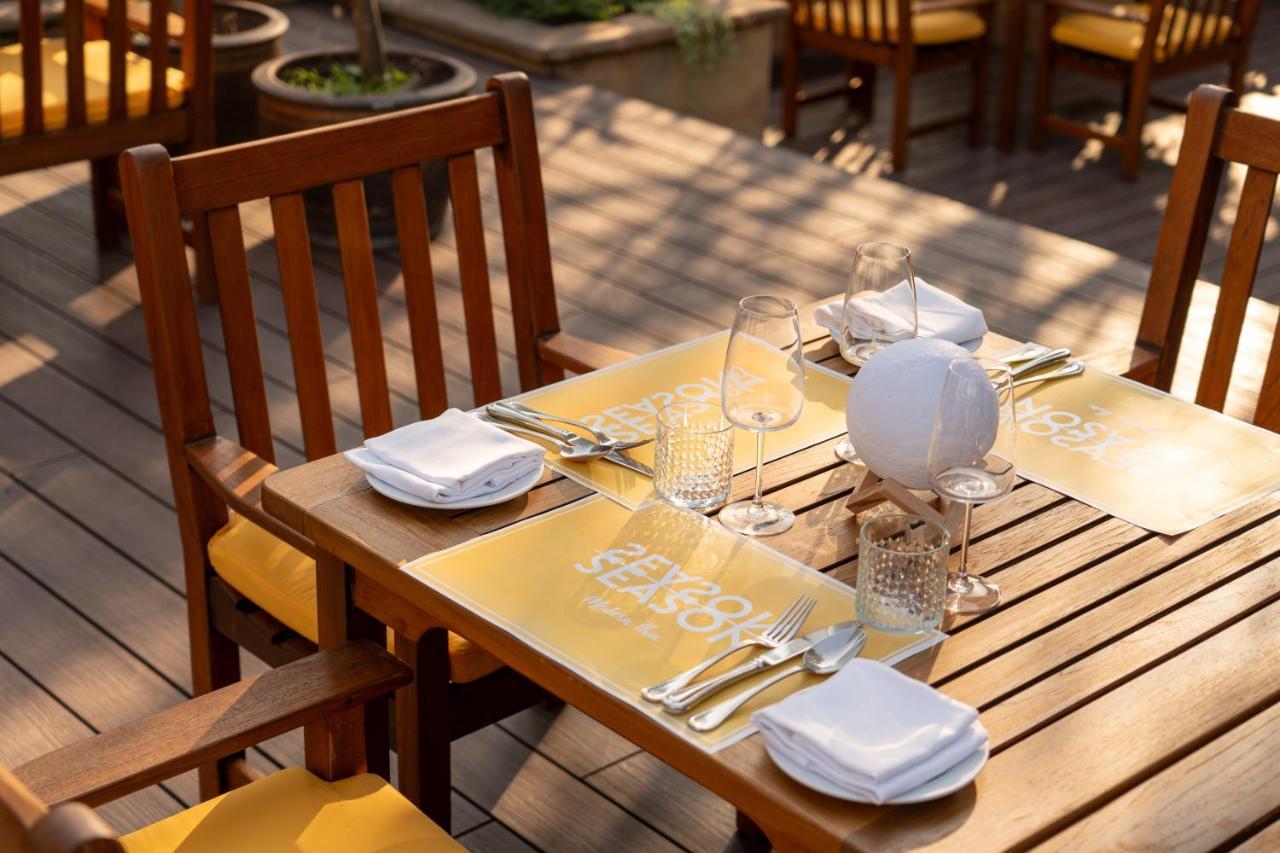 Nh Bangkok Sukhumvit Boulevard Εξωτερικό φωτογραφία A table at a restaurant